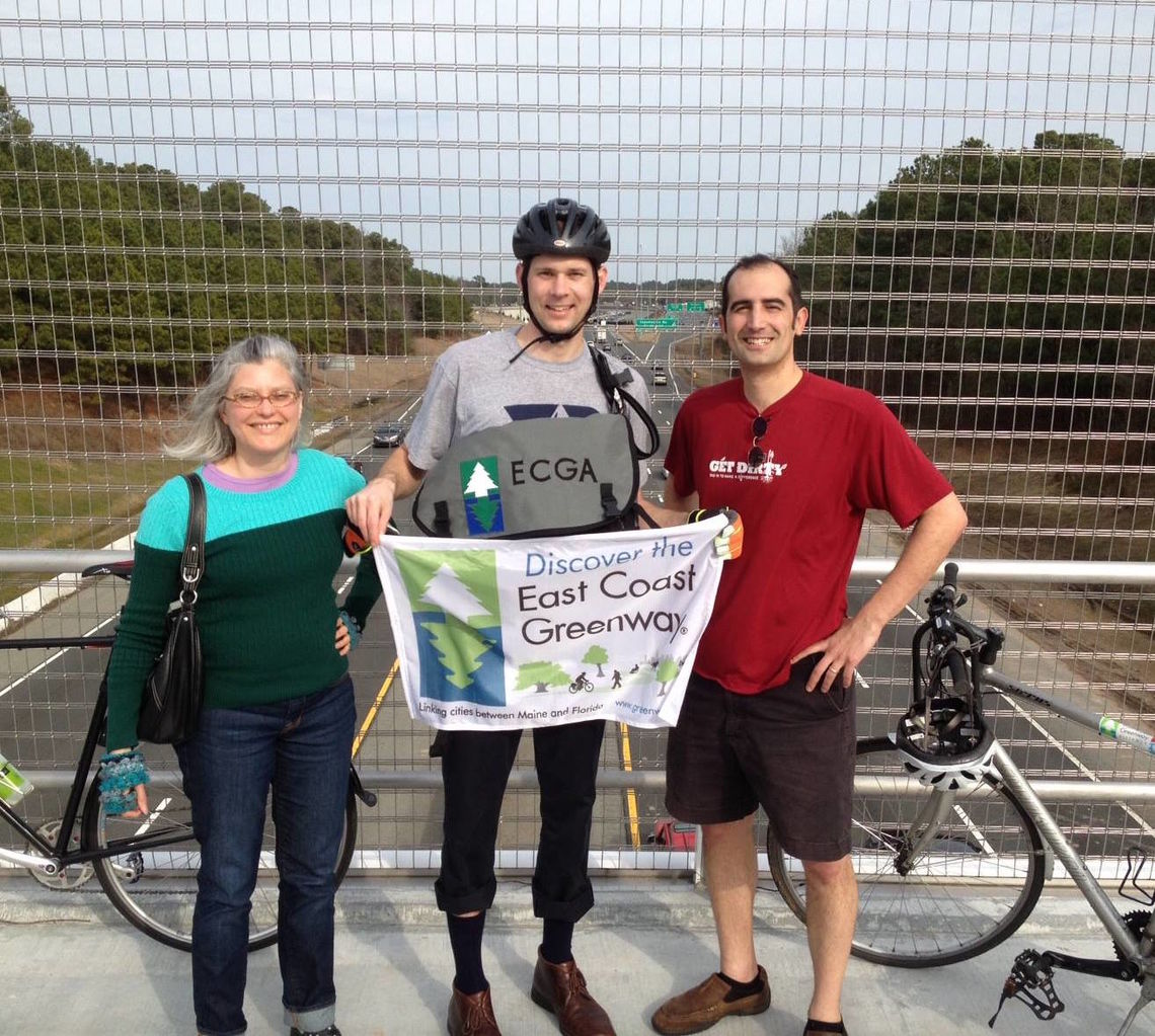 2014: Debbie West and Niles Barnes celebrate with Markatos-Soriano the opening of a bike-pedestrian bridge over Interstate 40 close to the Greenway headquarters in Durham, N.C.