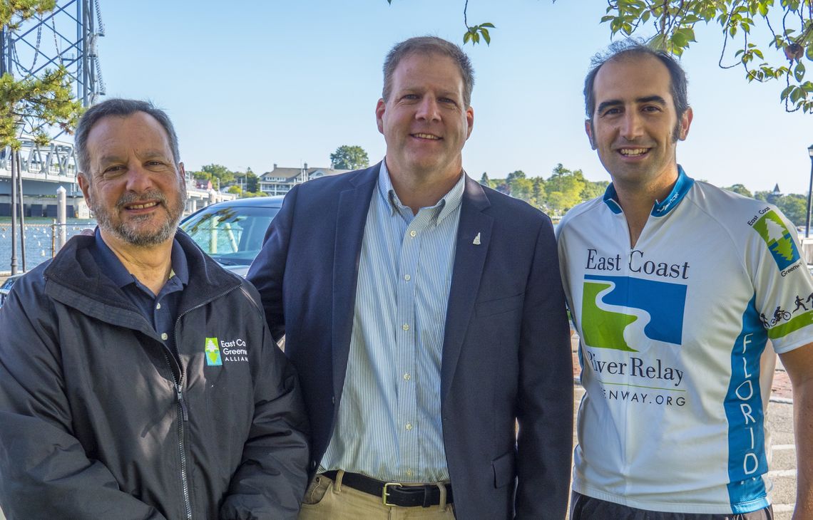 2017: Alliance trustee Robert Spiegelman (left) and Markatos-Soriano with N.H. Governor Chris Sununu in Portsmouth, N.H.The Alliance celebrated its 25th birthday with the East Coast River Relay, two months of events from Calais to Key West.