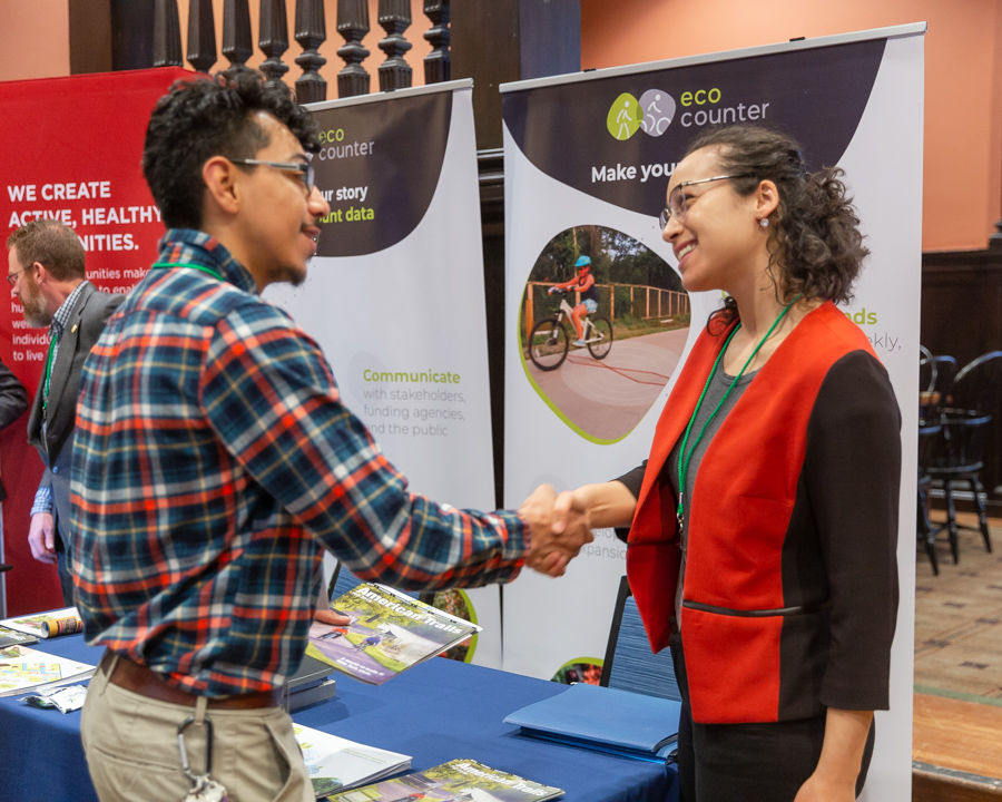 Visiting sponsor tables at the Expo Hall on Friday