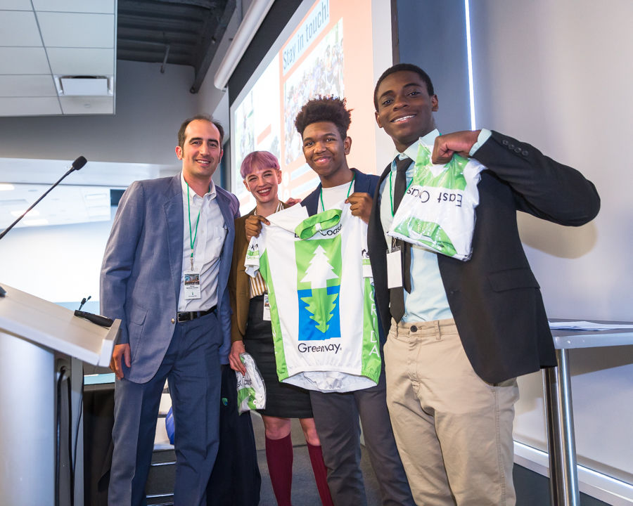 2019: At our first Mid-Atlantic Greenways & Trails Summit, Dennis presented bike jerseys to Taylor Kuyk-White, program manager of the Bicycle Coalition Youth Cycling Program, and Emir Johnson and Jahmiel Jackson, two Youth Advisory Committee members who spoke to attendees.